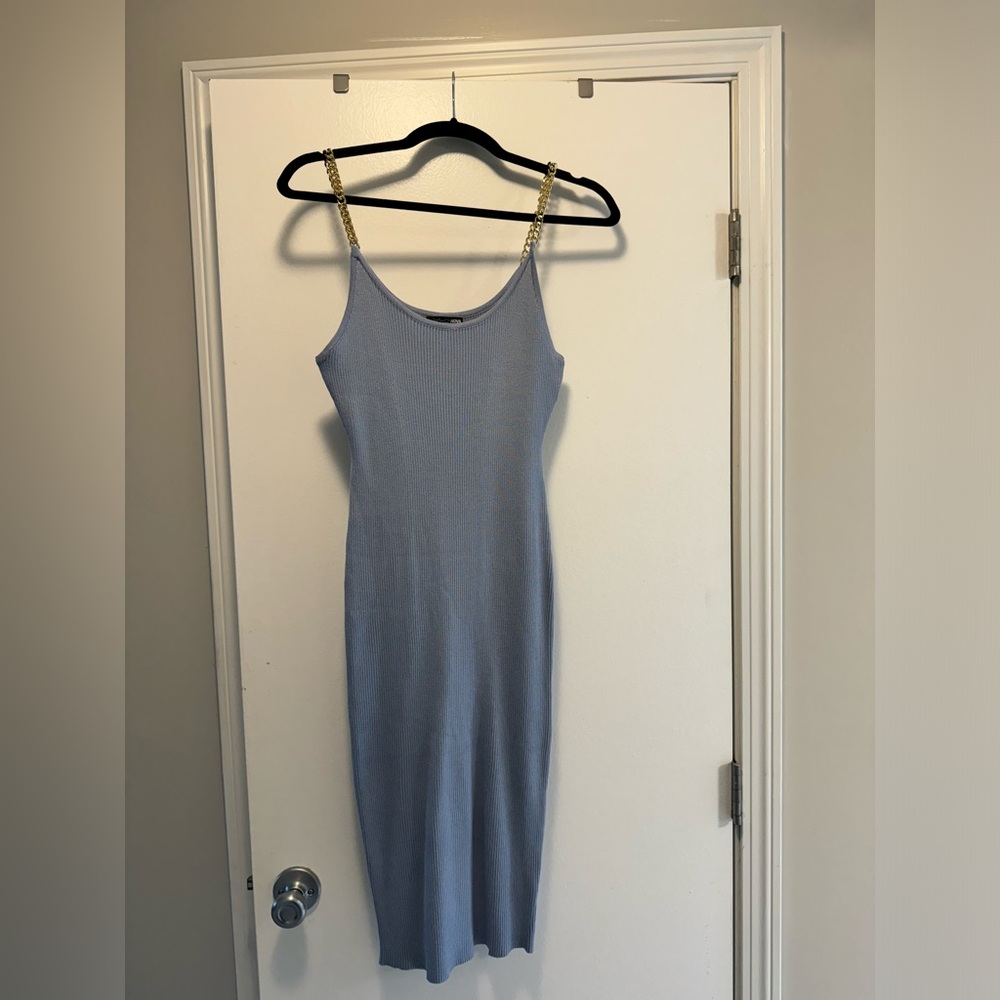 Women’s blue fitted dress with gold chain shoulder straps. Size L, never worn
